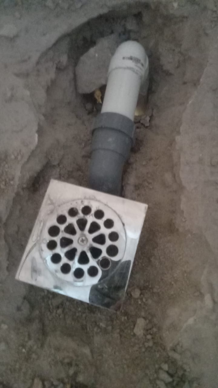 New PVC waste pipe and floor drain install