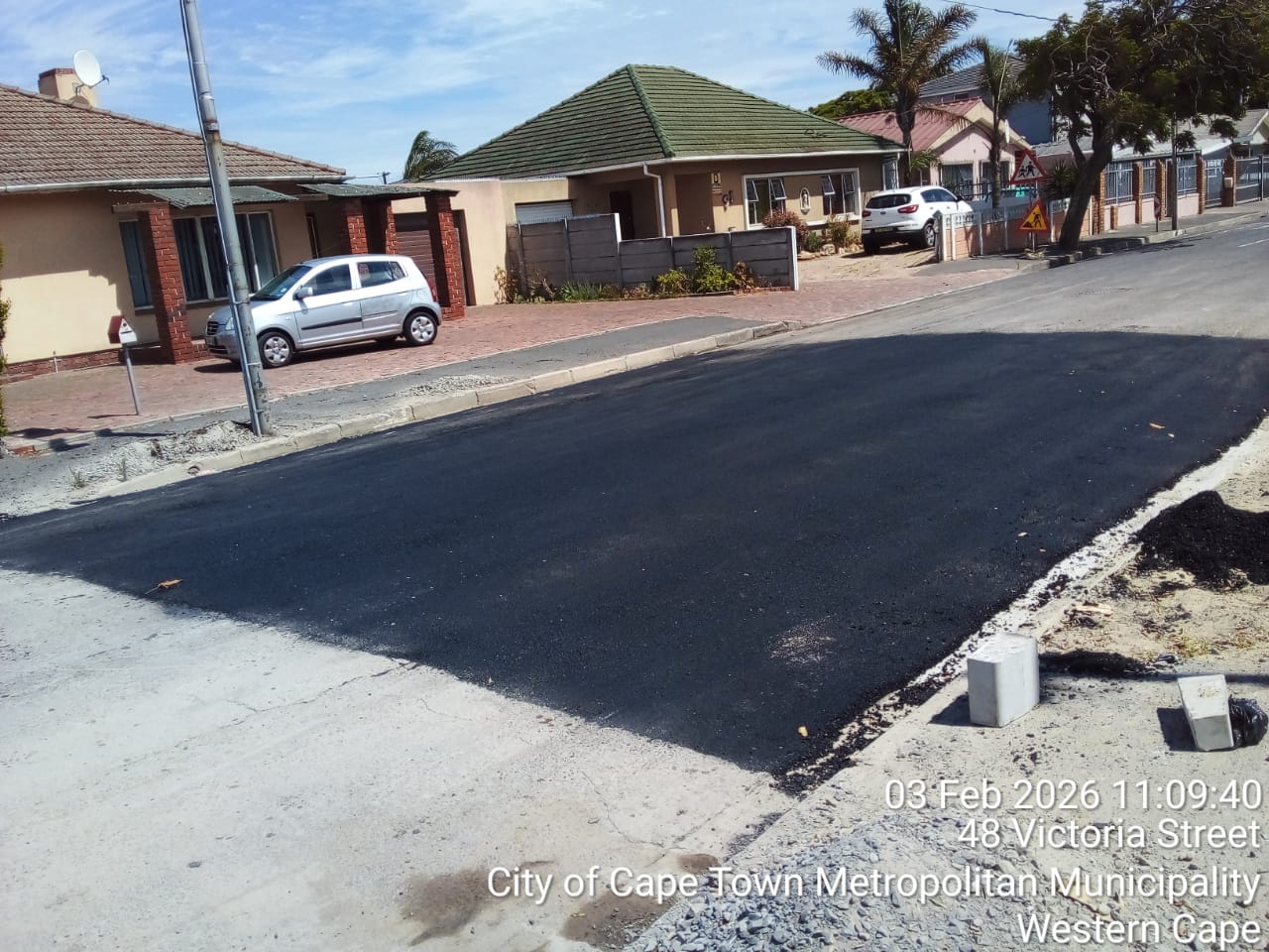 Fresh asphalt road resurfacing — Victoria Street